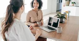 Early Childhood educator and parent during a parent-teacher meeting
