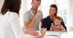 Family with infant at a meeting with their childcare center director